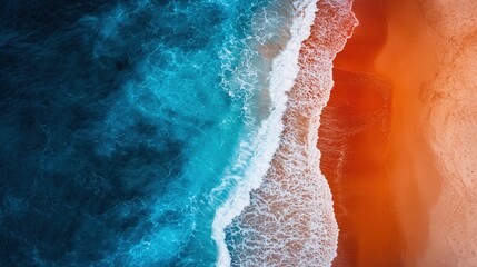 Aerial view of the Namib Desert meeting the Atlantic Ocean, creating dramatic natural contrasts