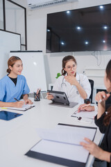 Group of doctors and business people meeting at the hospital