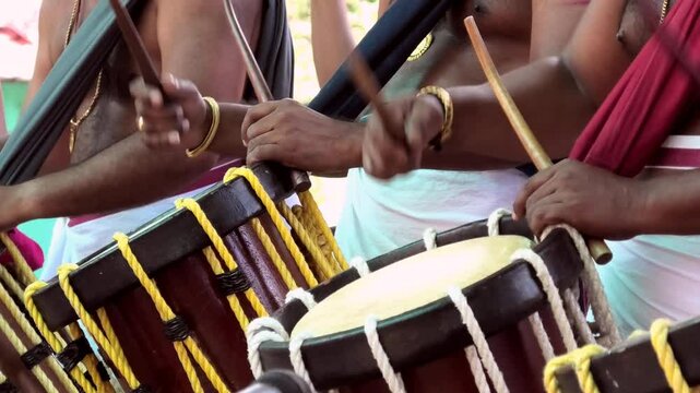 Artists performing Chendamelam, a traditional South Indian percussion orchestra	