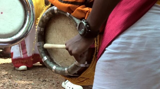 Artists playing Thavil, a South Indian percussion musical instrument
