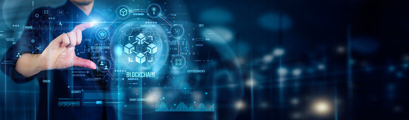 Businessman touching BLOCKCHAIN icons symbolizes secure, transparent, and decentralized technology transforming industries through trust, efficiency, and innovation worldwide.