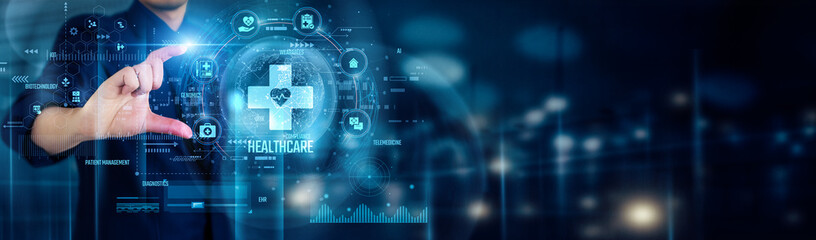 Businessman touching healthcare icons symbolizes innovation, technology, patient care, medical research, digital health, and improved healthcare services worldwide.