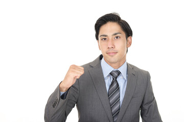 ガッツポーズの男性