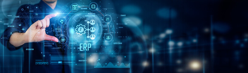 ERP. Businessman touching ENTERPRISE RESOURCE PLANNING icons represents integrating finance, supply chain, HR, and operations to streamline processes, and enable data-driven business decisions.
