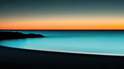 Tranquil ocean scene featuring colorful sunset reflections on water