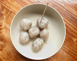 Food called sago ball or Cilok from Indonesia. Snack processed from sago served in plate.