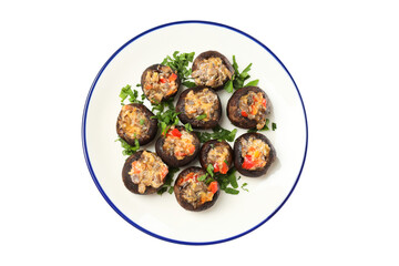 PNG stuffed mushrooms in a plate isolated on a white background.
