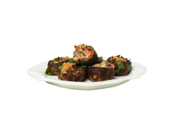 PNG stuffed mushrooms in a plate isolated on a white background.