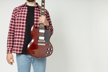 PNG,Wooden guitar in male hands close-up, isolated on white background