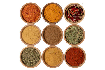 Assorted spices in bowls for cooking and seasoning food ingredients culinary herbs and flavor enhancers