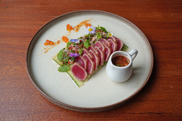 Seared Tuna Salad with Spicy sauce in Thai Northern Style. Beautiful Fusion food, Fine dining plate...