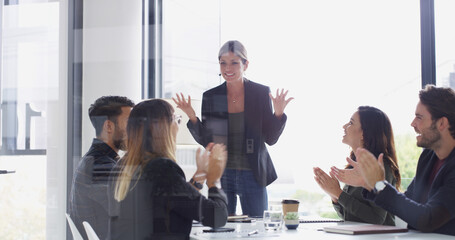 Colleagues, applause and success for speaker, boardroom and woman with smile for proposal or...