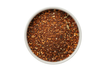 Bowl of crushed red pepper flakes seasoning spice for cooking and food photography stock image and background