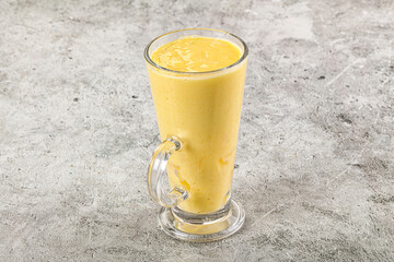 Cold sweet mango smoothie glass