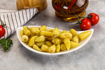 Turkish traditional marinated mini chili peppers