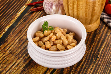 Baked white canned beans in the bowl