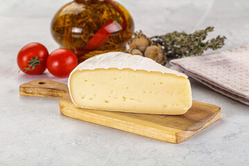 Soft brie cheese with mold