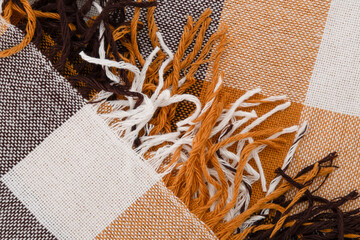 background checkered plaid sulfur, brown with white fabric close-up