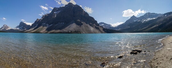 Majestic mountain landscape with turquoise lake and clear skies in the Canadian Rockies