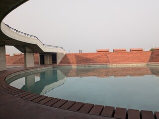 Circular Pool and Red Amphitheater Steps at Lotus Temple Complex
