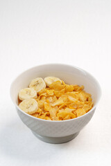 Colorful top-view bowl of fresh fruit, oats, and seeds showcasing a healthy, organic, vegan breakfast rich in vitamins and fiber.