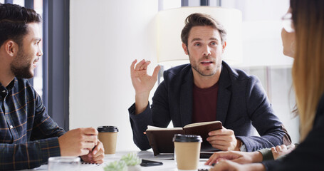 Meeting, notebook and teamwork with business people in office together for discussion or planning....