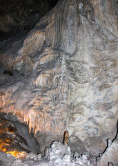 Exploring the stunning formations of an underground cave in the heart of nature