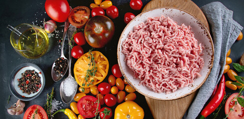 Ingredients for cooking - minced meat, tomatoes
