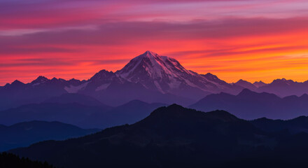 Fototapeta premium Majestic Mountain Range at Sunset Dramatic Pink and Orange Sky Colors Breathtaking Landscape Photography Scenic View Nature Background