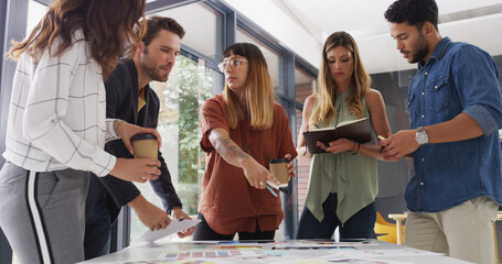 Creative, meeting and business people in office for planning, teamwork and ideas for book design....