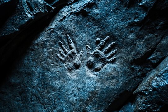 Ancient Handprints on Cave Wall