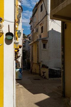Fototapeta Narrow streets in the old town Baska, Krk Island, Croatia
