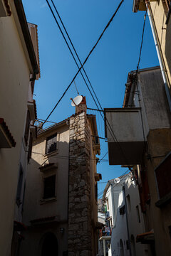Fototapeta Narrow streets in the old town Baska, Krk Island, Croatia