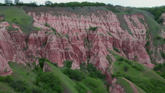 Pink mountain Rapa Rosie in Romania with erosion effects