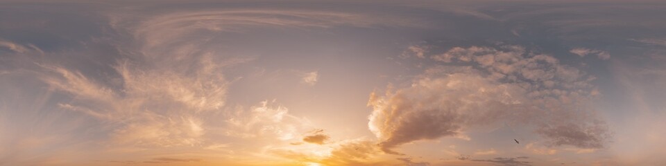 360 panorama of glowing sunset sky with bright Cirrus clouds. Seamless hdr spherical 360 panorama. Sky dome in 3D visualization, sky replacement for aerial drone panoramas. Weather and climate change