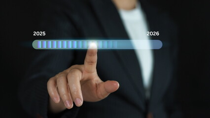 Concept of corporate transformation with finger touching progress bar toward 2026, reflecting marketing strategy, business planning, innovation trends