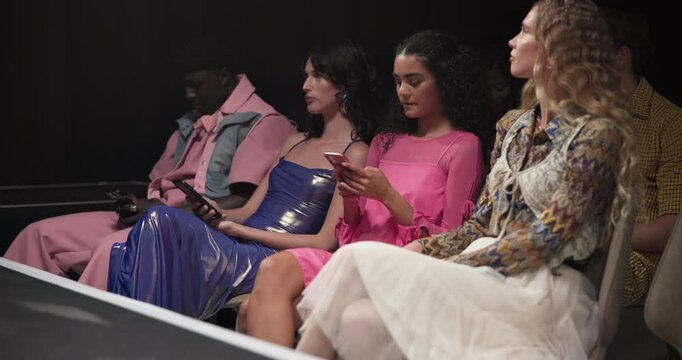Fashion show, first row and people and phone for luxury collection, magazine journalism and runway blog. Showcase review, designer network and catwalk with woman online for industry or trends analyst