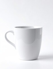Fototapeta premium A pristine white ceramic cup featuring a gracefully curved handle, resting on a smooth wooden surface, with soft natural light illuminating its glossy finish.