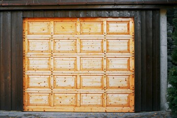 Residential garages with wooden doors