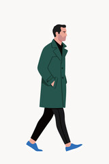 Man Wearing Green Coat Walking With Hands In Pockets