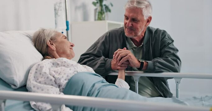 Talking, hospital bed and senior couple holding hands for comfort, support and empathy for recovery. Healthcare, marriage and elderly man and woman visit for compassion, care and help for wellness