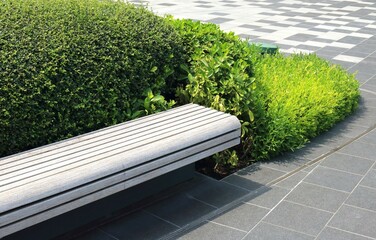 Classic long wooden chair in the garden