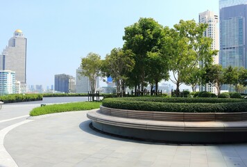 Classic long wooden chair with City background