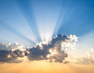 Sunbeams piercing clouds at sunset