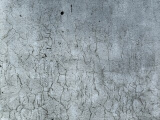 Texture of old concrete wall.Concrete wall of light grey color cement texture background.Grey pastel rough crack cement texture stone concrete,rock plastered stucco wall; painted flat fade background.