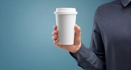 hand holding a cofee 