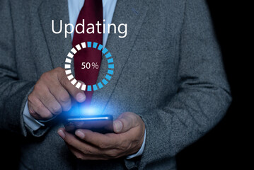 Person using smartphone installing update process for Improved functionality in the new version. Installing update concept on phone screen.