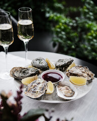 Indulge in Elegant Oysters paired with refreshing Champagne for a