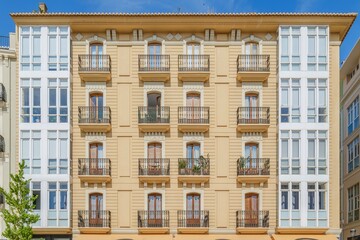 Elegant Residential Building Facade With Balconies in Valencia Spain. Traditional European Architecture, Urban Living, City Apartment Block