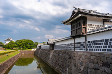 Kanazawa Castle and Moat in Japan on Summer Day